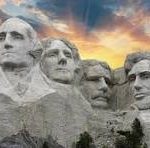 "Mount Rushmore National Memorial, featuring the carved faces of four U.S. presidents: George Washington, Thomas Jefferson, Theodore Roosevelt, and Abraham Lincoln, set against a backdrop of the Black Hills in South Dakota."